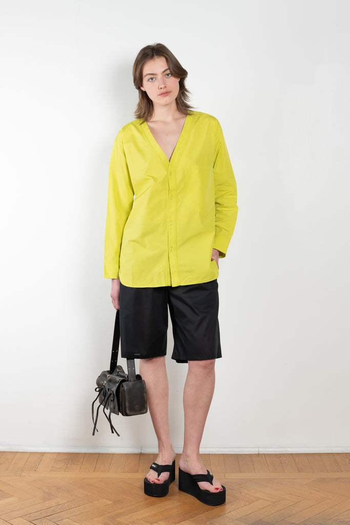 The V Shirt by Monique Van Heist is a loose fitted shirt with baseball inspired details