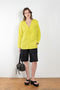 The V Shirt by Monique Van Heist is a loose fitted shirt with baseball inspired details