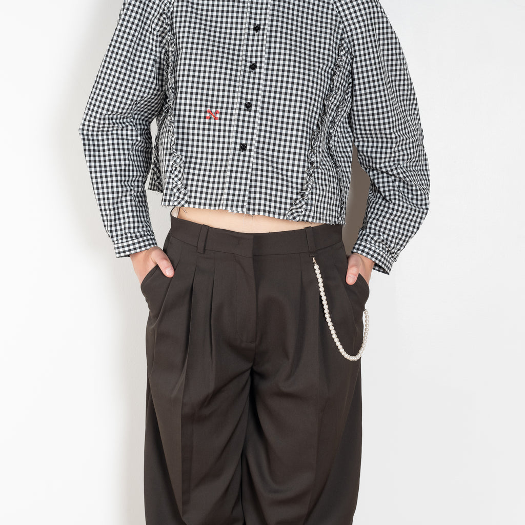 The Aga Pants by Nackiye is a pleated peg style pants with an easy fit