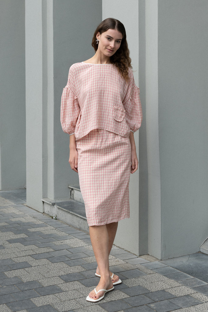 The Baby Love Top by Nackiye is a loose balloon sleeve top with pin-tuck details