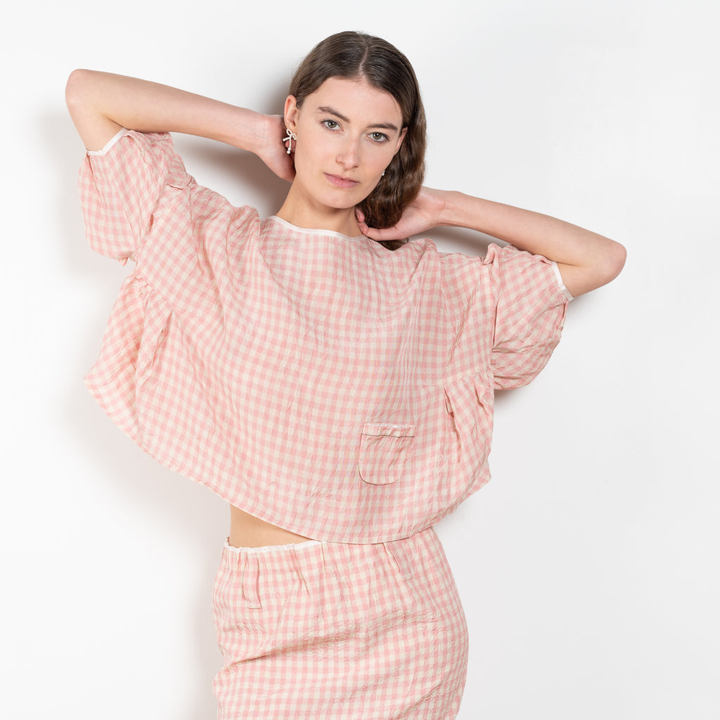 The Baby Love Top by Nackiye is a loose balloon sleeve top with pin-tuck details
