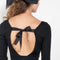 The Dancer Knit Top by Nackiye is a fine rib top with an open back and grosgrain bow ties on the back