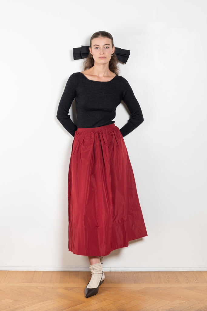 The Dancer Knit Top by Nackiye is a fine rib top with an open back and grosgrain bow ties on the back