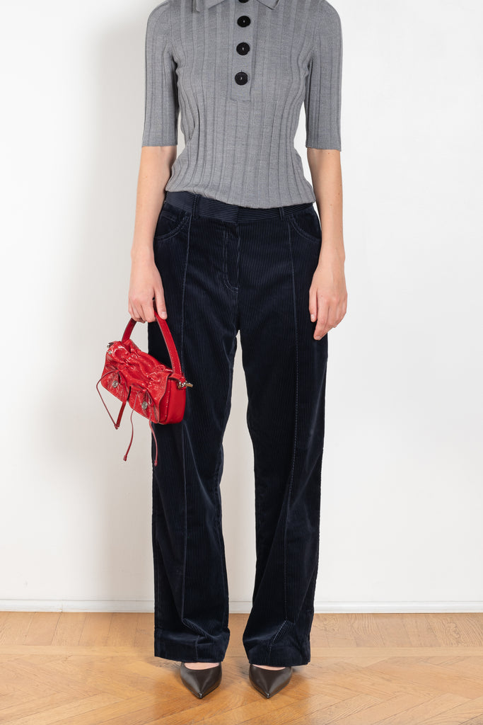 The Downtown Pant by Nackiye is a straight trouser with front pin tuck details in a deep midnight ribbed velvet