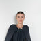 The Grand Bazaar Dress by Nackiye is a signature dress with shawl shoulder feature, two pockets, front slit and a belt, and the classic double pearl neck pin 