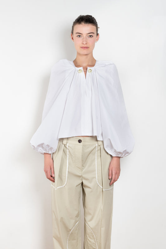 The Grand Bazaar Mini Top by Nackiye is a signature top with shawl shoulder feature and the classic double pearl neck pin in a mini version