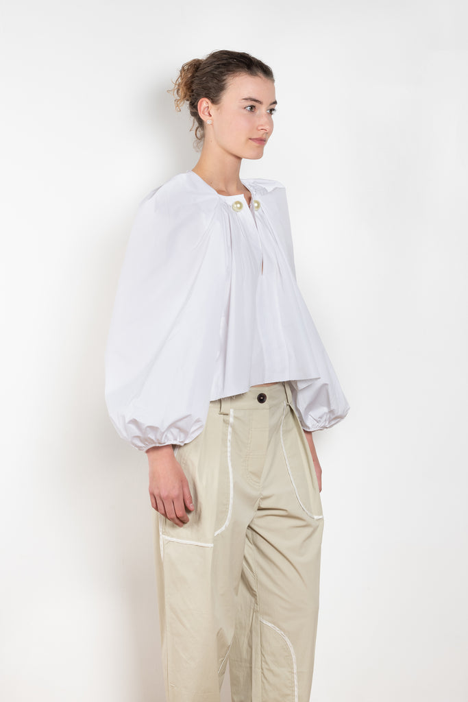 The Grand Bazaar Mini Top by Nackiye is a signature top with shawl shoulder feature and the classic double pearl neck pin in a mini version