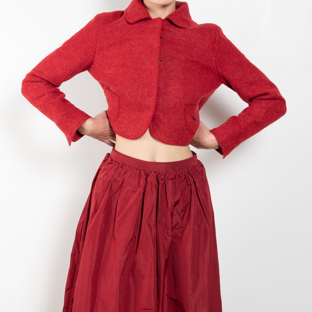 The Kelly Skirt by Nackiye is a signature taffeta skirt cinched at the waist