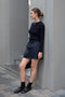 The Mini Skirt by Nackiye is gathered at the waist and featuring two side pockets, the little mini also has raw edging embellished with a rubber like piping