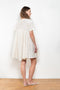 The Peony Dress by Nackiye is a sweet short babydoll inspired dress with a detachable collar detail and an pearl pin embellishment