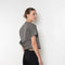 The Pixie Top by Nackiye is a fresh take on the classic shirt. Sleek A-line silhouette, short sleeves & a detachable back belt