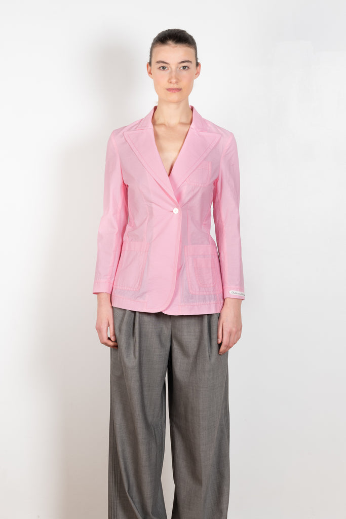 The Second Skin Jacket by Nackiye is a fitted tailored shirt jacket in a bright candy pink cotton blend