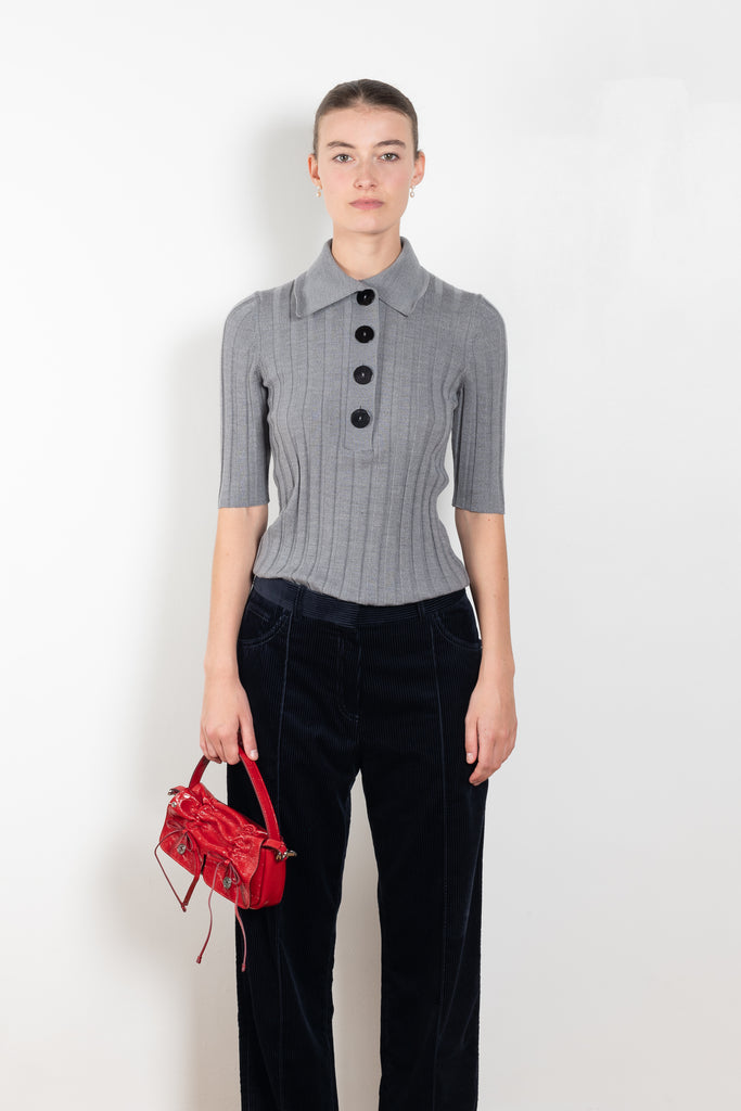 The Sugarman Polo by Nackiye is a fine knit polo with mother of pearl buttons