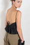 The Surf Rider Top by Nackiye is a delicate strappy top in cotton with a ruffle hem
