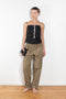 The Surf Rider Top by Nackiye is a delicate strappy top in cotton with a ruffle hem