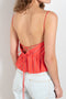 The Surf Rider Top by Nackiye is a delicate strappy top in cotton with a ruffle hem