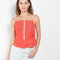 The Surf Rider Top by Nackiye is a delicate strappy top in cotton with a ruffle hem