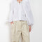 The Weekend Pants by Nackiye is a cargo inspired pants with& exaggerated piping details along the pockets and inner bottom hems