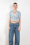 The Floral Cut-out Top by Paco Rabanne is a cropped top in jersey with a front and back cut-out