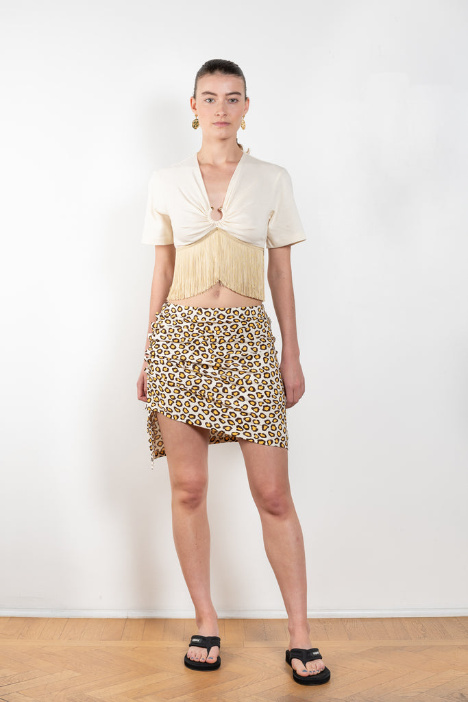 The Leopard Skirt by Paco Rabanne is a mini skirt with adjustable press buttons in a leopard print