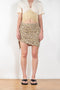 The Leopard Skirt by Paco Rabanne is a mini skirt with adjustable press buttons in a leopard print