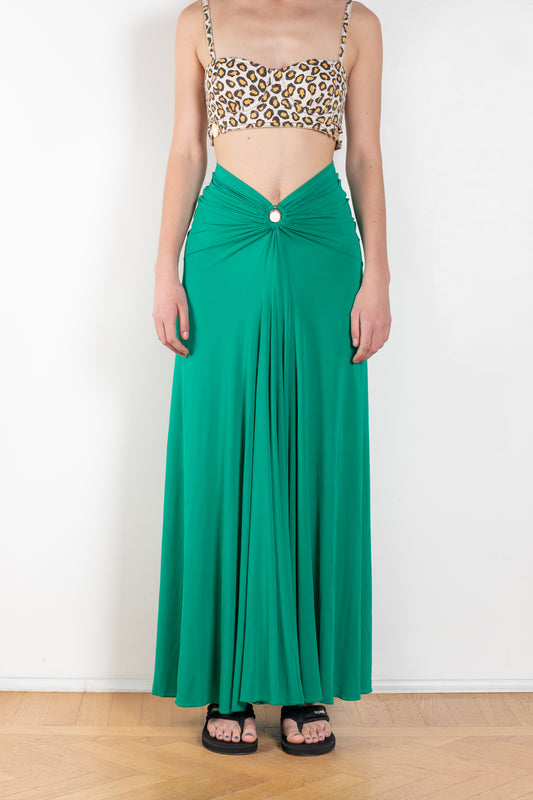 The Long Skirt by Paco Rabanne is a long flowy jersey skirt with a PR embellishment at the waist