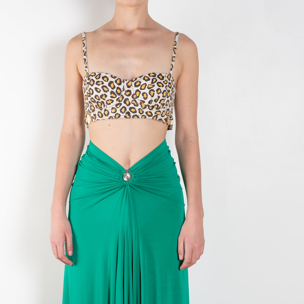 The Long Skirt by Paco Rabanne is a long flowy jersey skirt with a PR embellishment at the waist