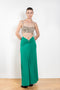 The Long Skirt by Paco Rabanne is a long flowy jersey skirt with a PR embellishment at the waist