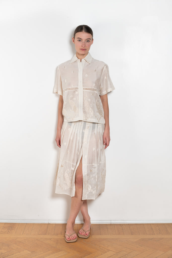The Ada Skirt by SS Daley is a knee length pleated skirt in a cotton voile with a delicate embroidered print