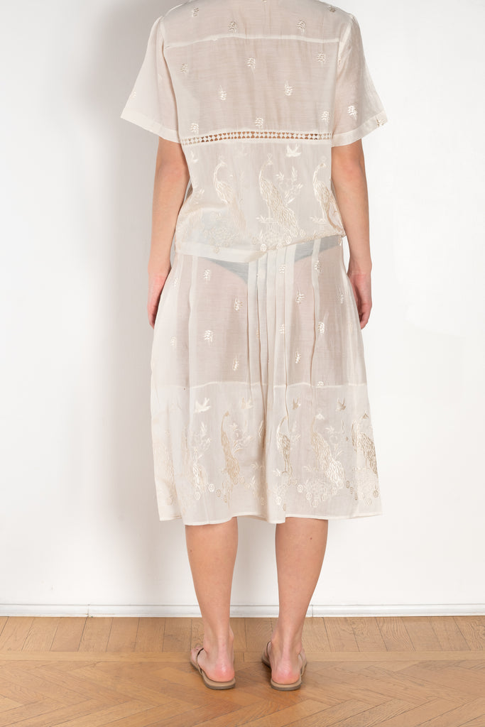 The Ada Skirt by SS Daley is a knee length pleated skirt in a cotton voile with a delicate embroidered print
