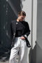 The Orla Trouser by SS Daley is a fluid silk trouser with a wide leg and a sheer hem
