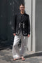 The Orla Trouser by SS Daley is a fluid silk trouser with a wide leg and a sheer hem