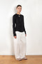 The Orla Trouser by SS Daley is a fluid silk trouser with a wide leg and a sheer hem