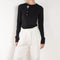 The Orla Trouser by SS Daley is a fluid silk trouser with a wide leg and a sheer hem