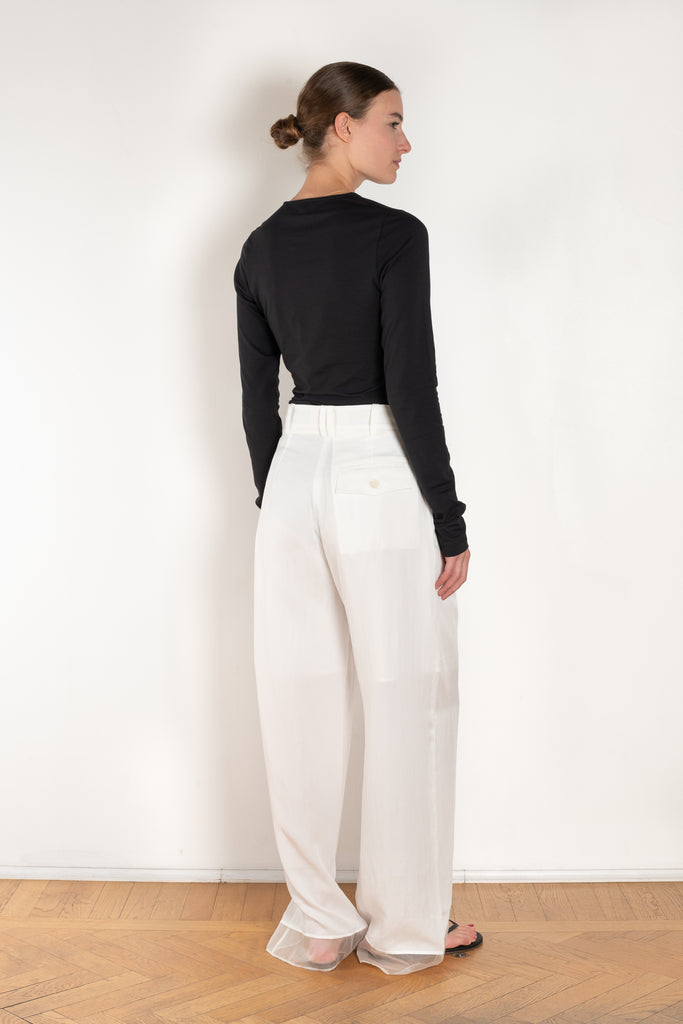 The Orla Trouser by SS Daley is a fluid silk trouser with a wide leg and a sheer hem