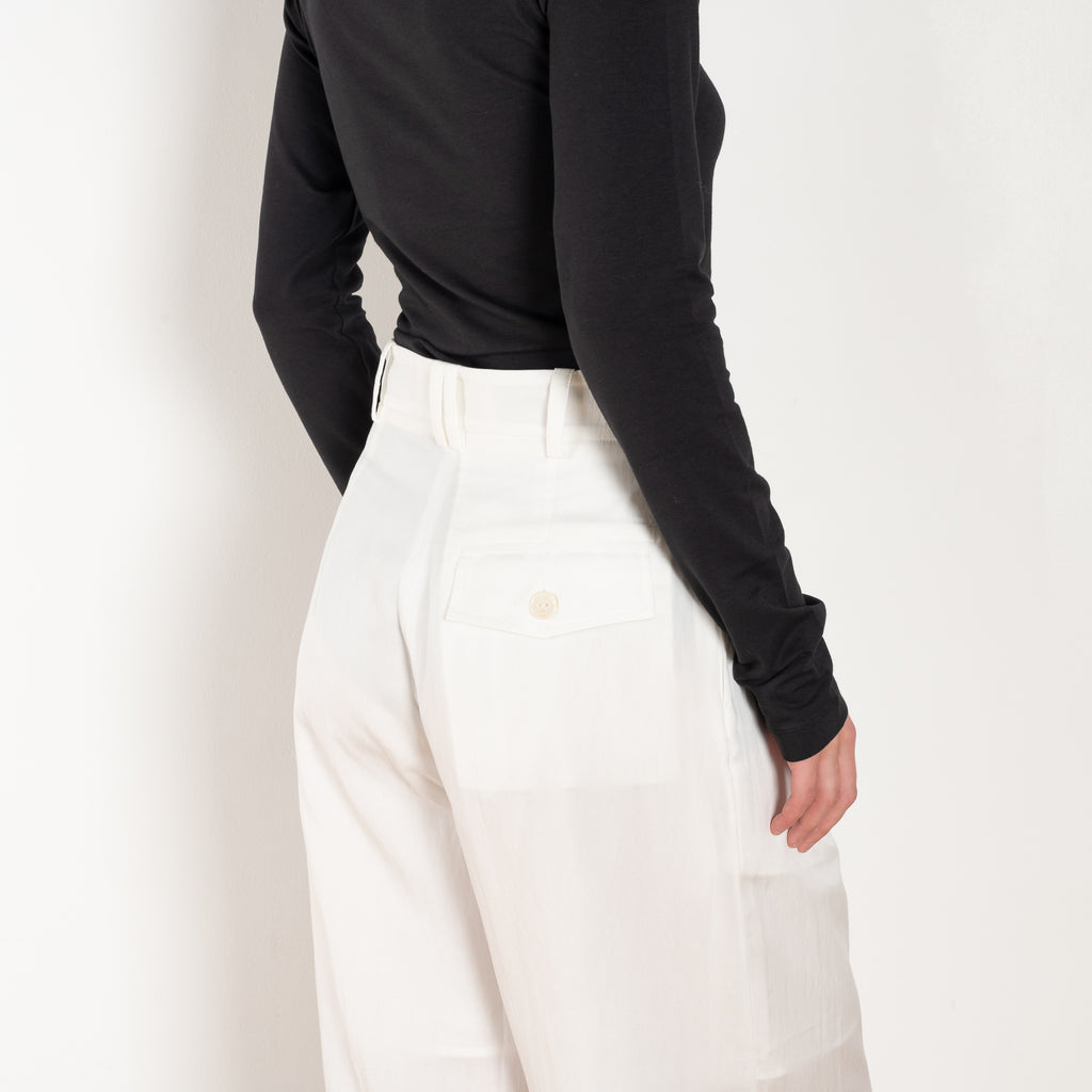 The Orla Trouser by SS Daley is a fluid silk trouser with a wide leg and a sheer hem