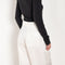 The Orla Trouser by SS Daley is a fluid silk trouser with a wide leg and a sheer hem