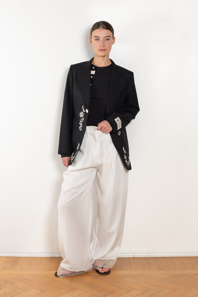 The Orla Trouser by SS Daley is a fluid silk trouser with a wide leg and a sheer hem