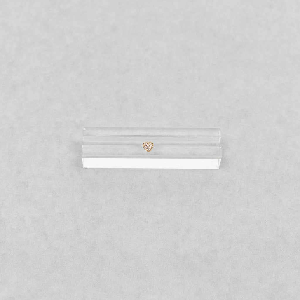 The Petit Coeur by Sophie Bille Brahe is a feminine and delicate stud earring shaped as a heart with small diamonds placed in a pavé setting