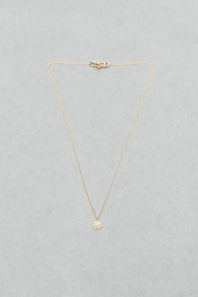 The Soleil Simple Necklace by Sophie Bille Brahe is a delicate necklace featured with a pendant inspired by the sun