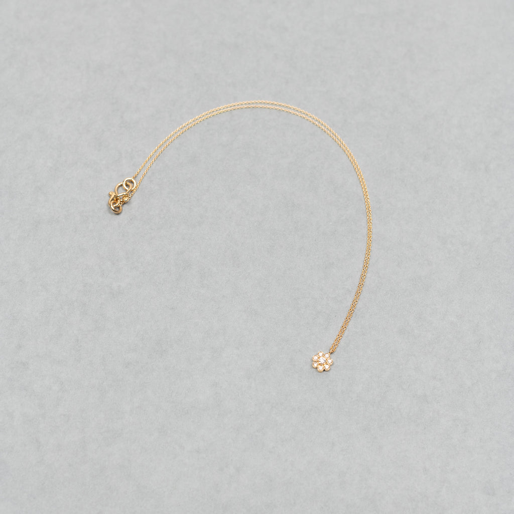 The Soleil Simple Necklace by Sophie Bille Brahe is a delicate necklace featured with a pendant inspired by the sun