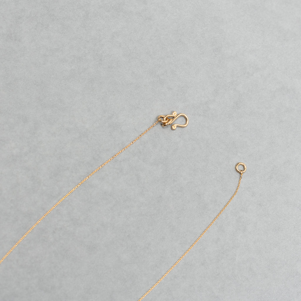 The Soleil Simple Necklace by Sophie Bille Brahe is a delicate necklace featured with a pendant inspired by the sun