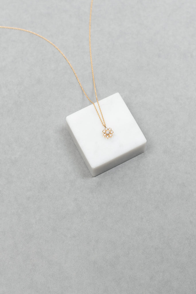 The Soleil Simple Necklace by Sophie Bille Brahe is a delicate necklace featured with a pendant inspired by the sun