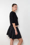 The Fousta Cotton Skirt by Suzie Kondi has an elastic pull-on waist, side pockets, and lightweight fabric