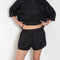 The Hera Linen Bloomers by Suzie Kondi has a playful design that flatters the figure with its softly pouched and slightly billowing shape