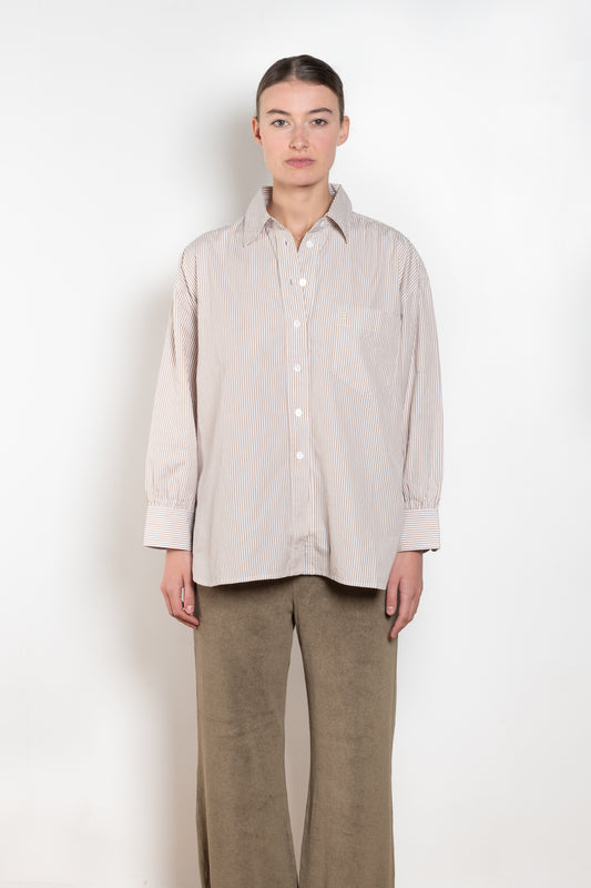 The Kappa Cotton Shirt by Suzie Kondi has an oversized fit, cuffed wrists and a full swing to the body for added comfort