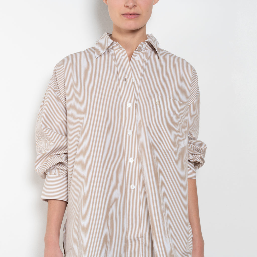 The Kappa Cotton Shirt by Suzie Kondi has an oversized fit, cuffed wrists and a full swing to the body for added comfort