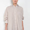 The Kappa Cotton Shirt by Suzie Kondi has an oversized fit, cuffed wrists and a full swing to the body for added comfort