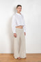 The  Leuka Cropped Shirt by Suzie Kondi has a cropped boxy fit, cuffed wrists for a crisp look.