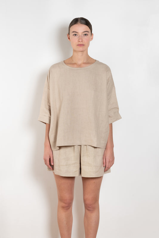 The Saria Top Linen by Suzie Kondi is an easy linen top with a simple and effortlessly chic silhouette made for versatility
